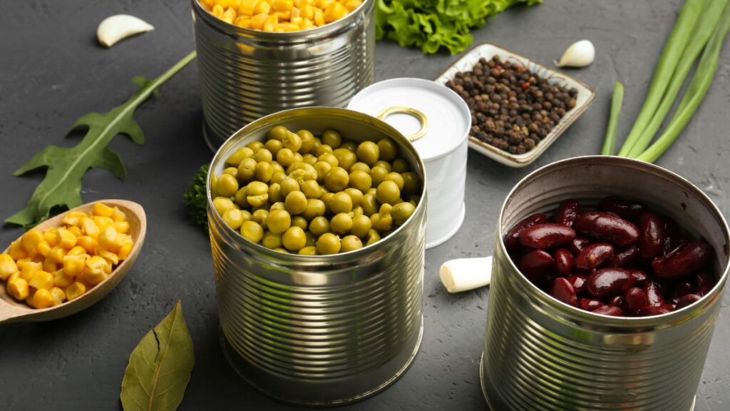 Canned beans on a kitchen counter.