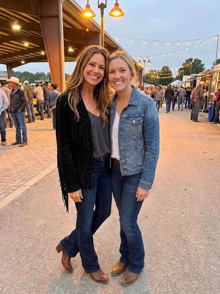 Girls' night country concert outfit with a fringe suede jacket for women over 50.